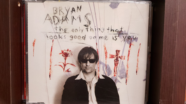 Accords et paroles The Only thing that looks good on me is you Bryan Adams