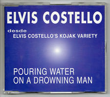 Accords et paroles Pouring Water On A Drowning Man Elvis Costello